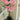 Pink artificial orchid plant in a pot indoors