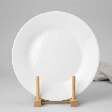 White plate on a wooden stand